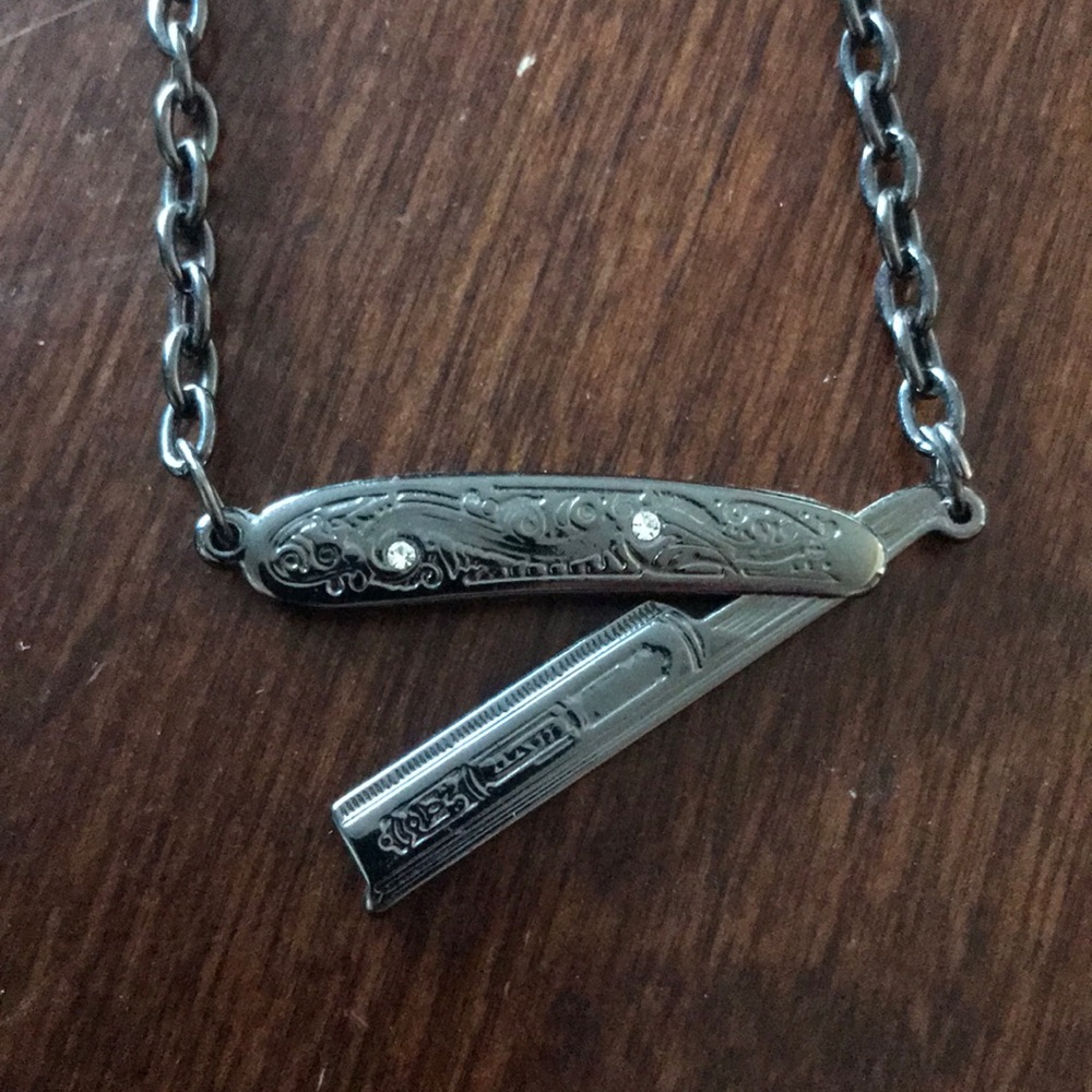 Sourpuss straight razor necklace